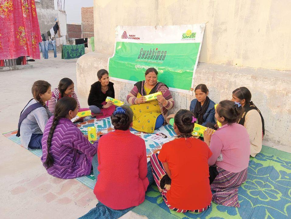 Girls in classroom learning about menstrual health